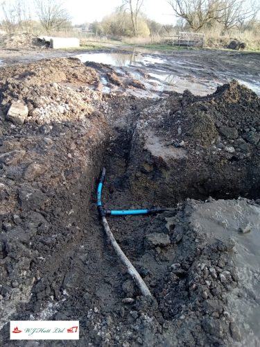 Replacing a broken tee junction in a farmyard